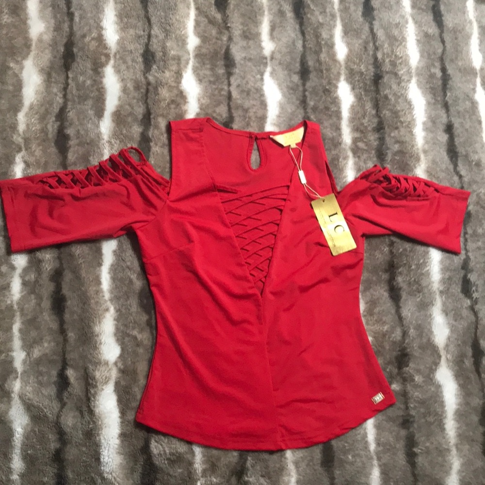Brand new cold shoulder top.